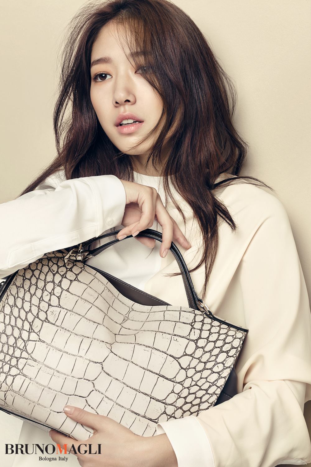 Park Shin Hye models her stylish handbags for Brunomagli