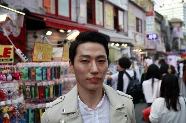 Lee Woo Jung, a gym trainer out and about in Hongdae shopping for make up products.