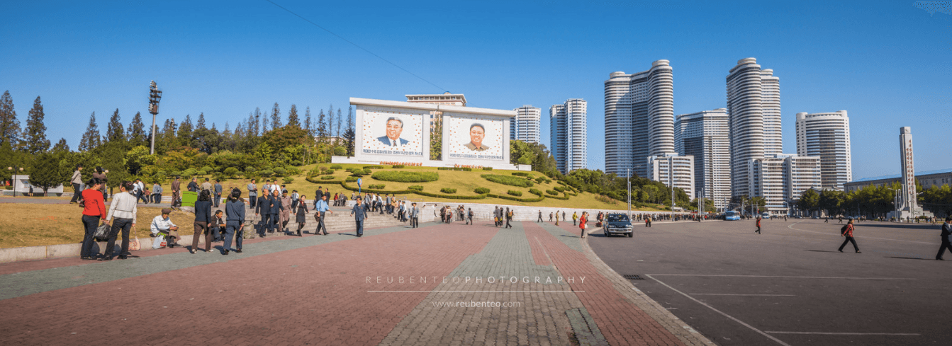 KIM PORTRAITS IN FRONT OF CHANGJON STREET APARTMENT COMPLEX