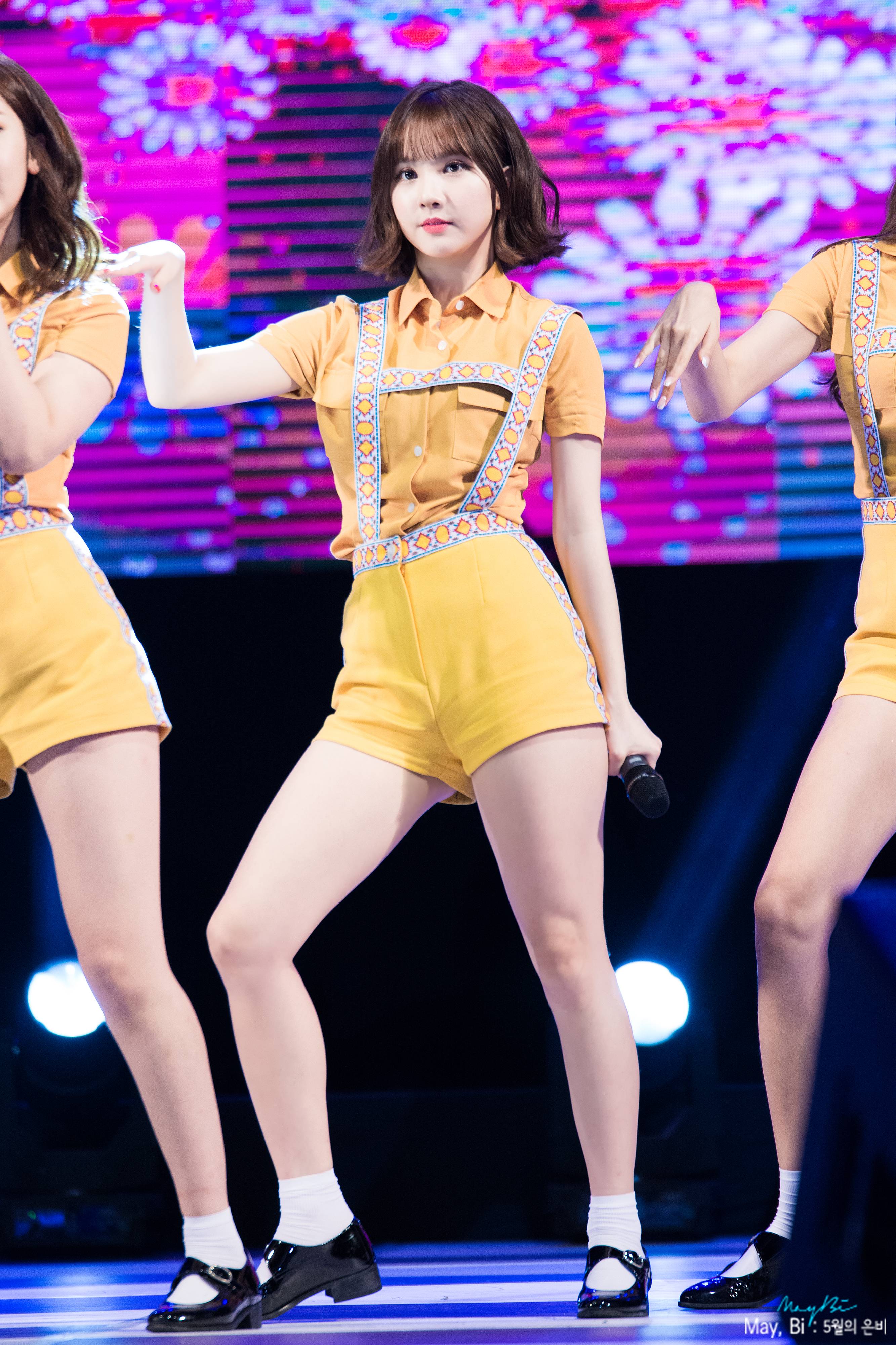 The yellow short shorts of course show off her legs. eunha3. 