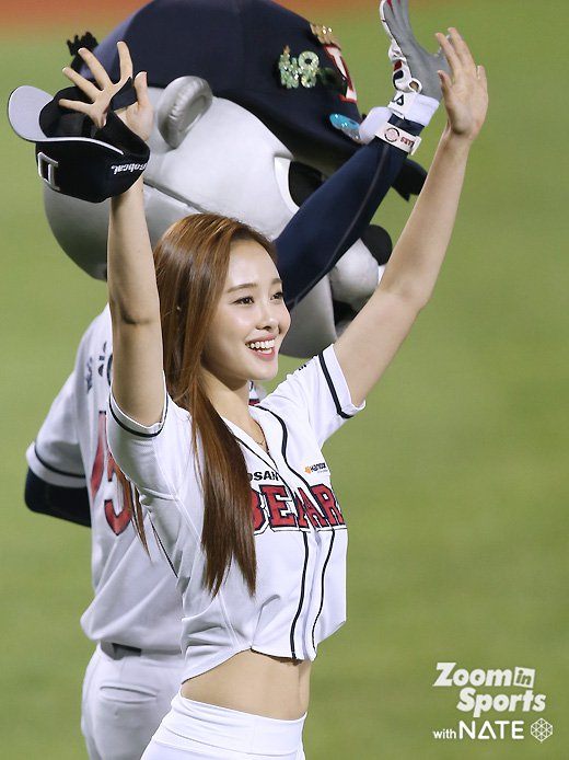 18 year old Korean girl group member cosplays as Chun-Li and shows off her  flexibility when she tosses first pitch at baseball game